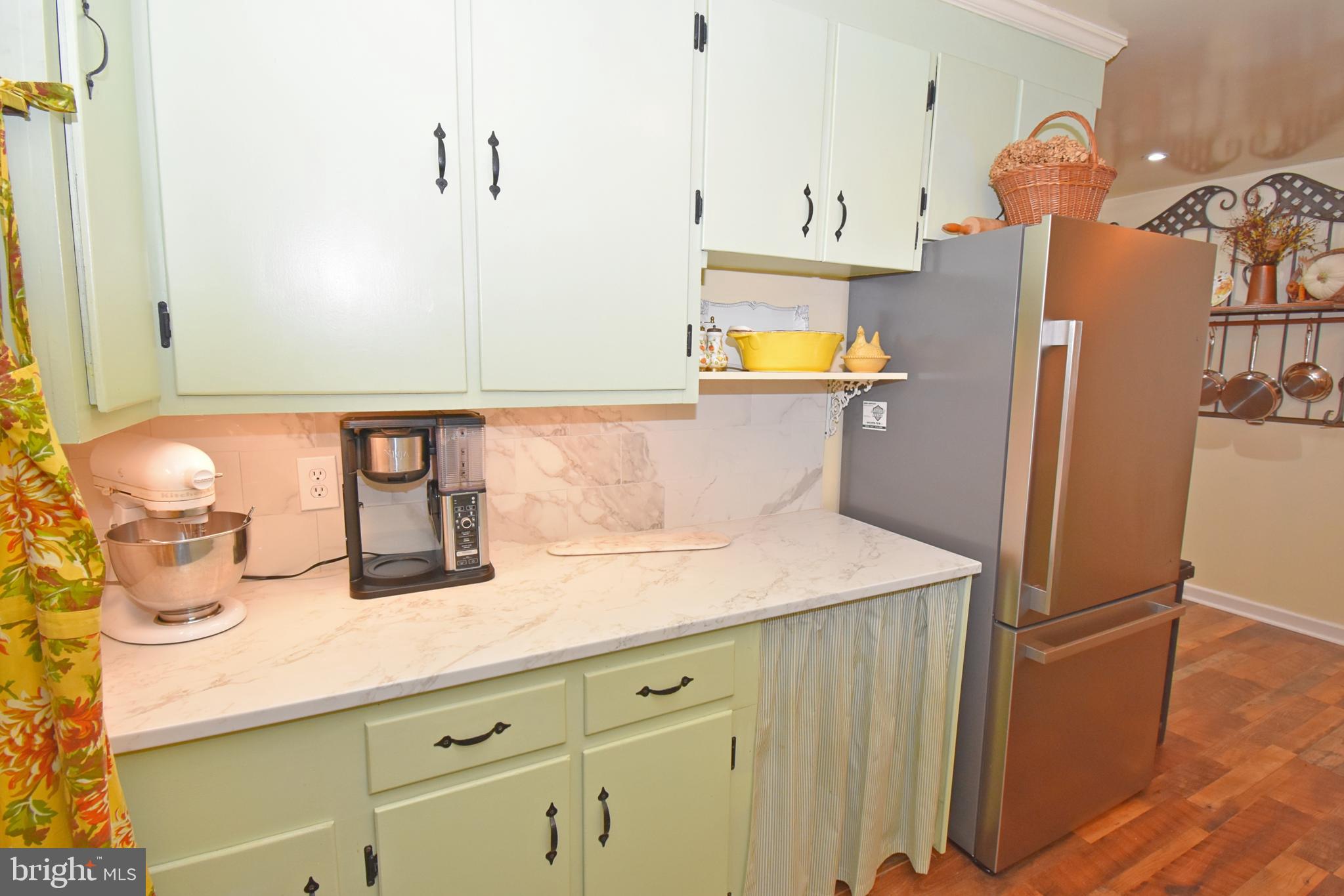 30223 Mt Vernon Road Princess Anne, MD 21853 - Photo 10 of 53 a bathroom with a sink and a mirror