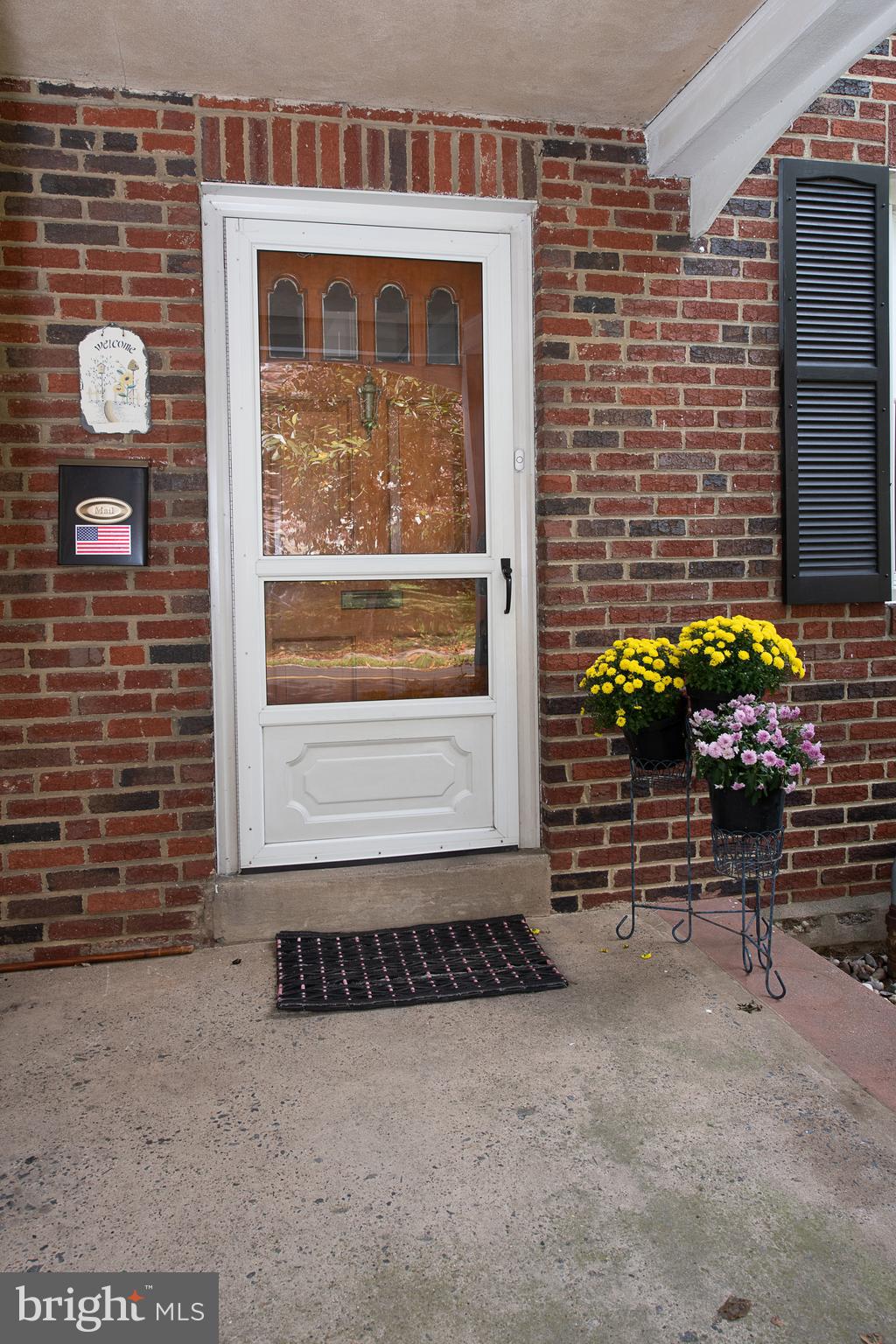1454 Manoa Road Wynnewood, PA 19096 - Photo 4 of 41 a front view of a house with a outdoor space