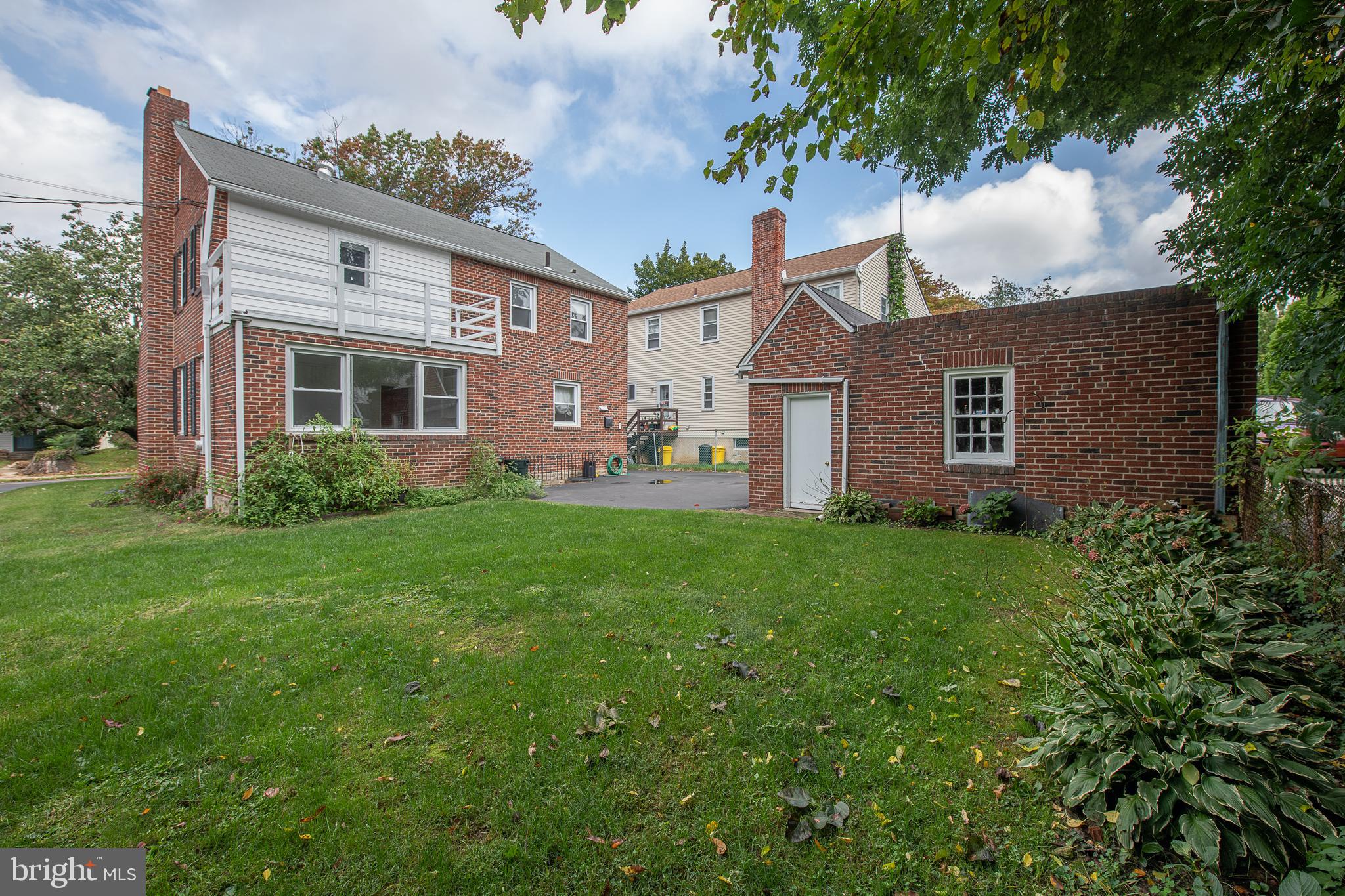 1454 Manoa Road Wynnewood, PA 19096 - Photo 35 of 41 a view of a house with backyard