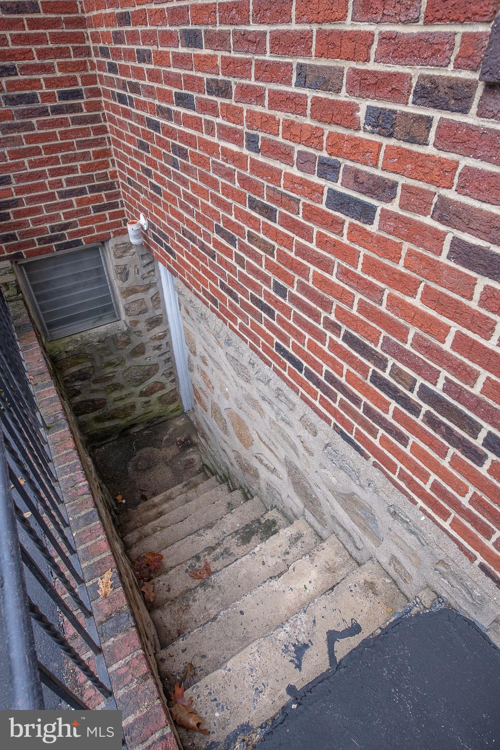 1454 Manoa Road Wynnewood, PA 19096 - Photo 39 of 41 a view of a brick wall with wooden walls