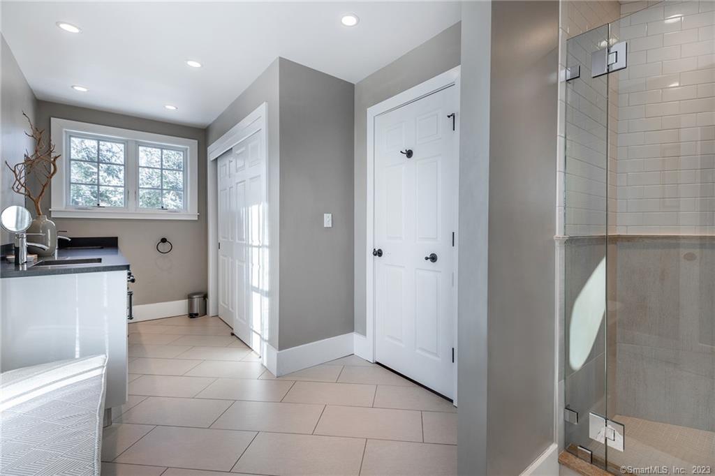 104 Lower Church Hill Road Washington, CT 06794 - Photo 15 of 23 a view of kitchen with a refrigerator cabinet and windows