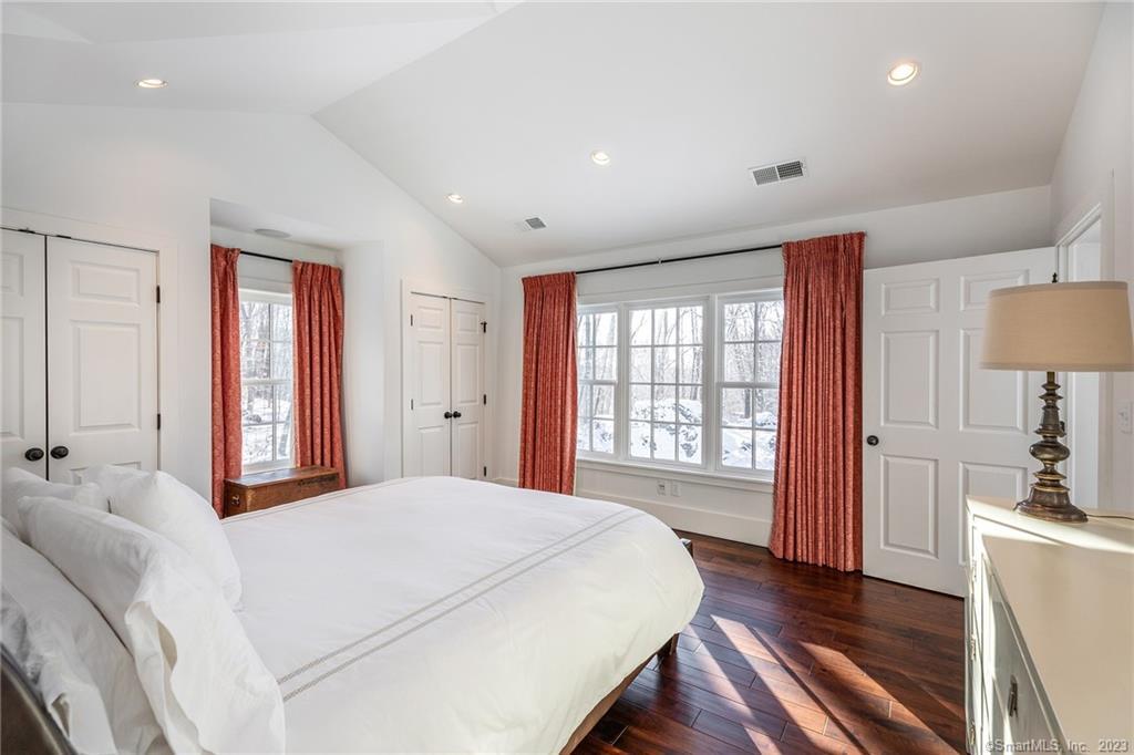 104 Lower Church Hill Road Washington, CT 06794 - Photo 17 of 23 a spacious bedroom with a large bed and a window