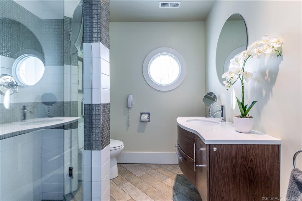 104 Lower Church Hill Road Washington, CT 06794 - Photo 20 of 23 a bathroom with a sink and a mirror