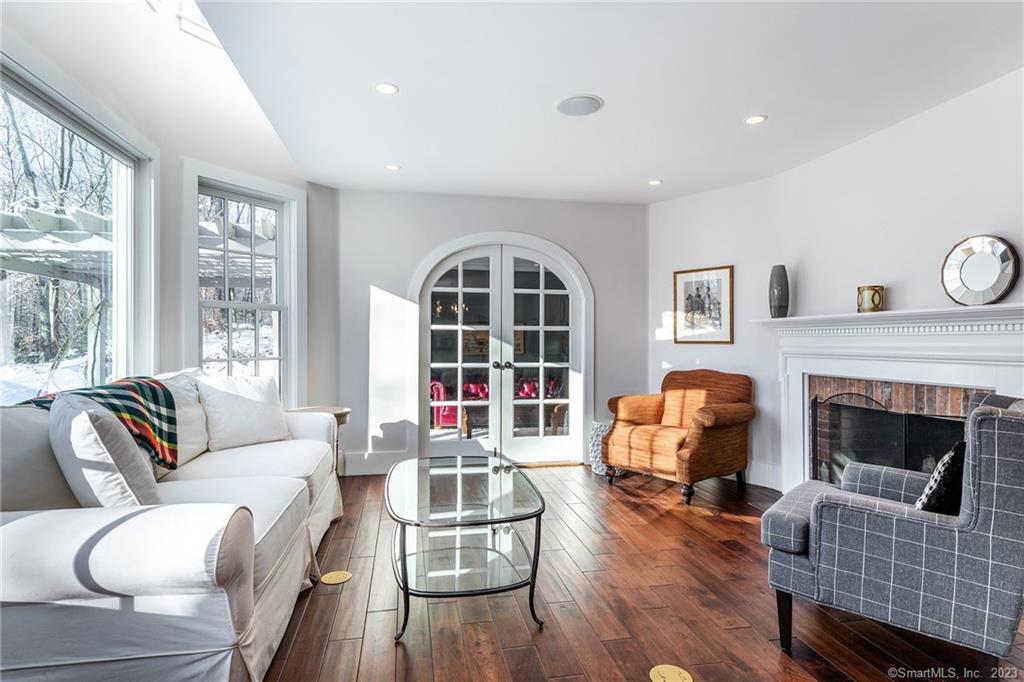 104 Lower Church Hill Road Washington, CT 06794 - Photo 23 of 23 a living room with furniture fireplace and window