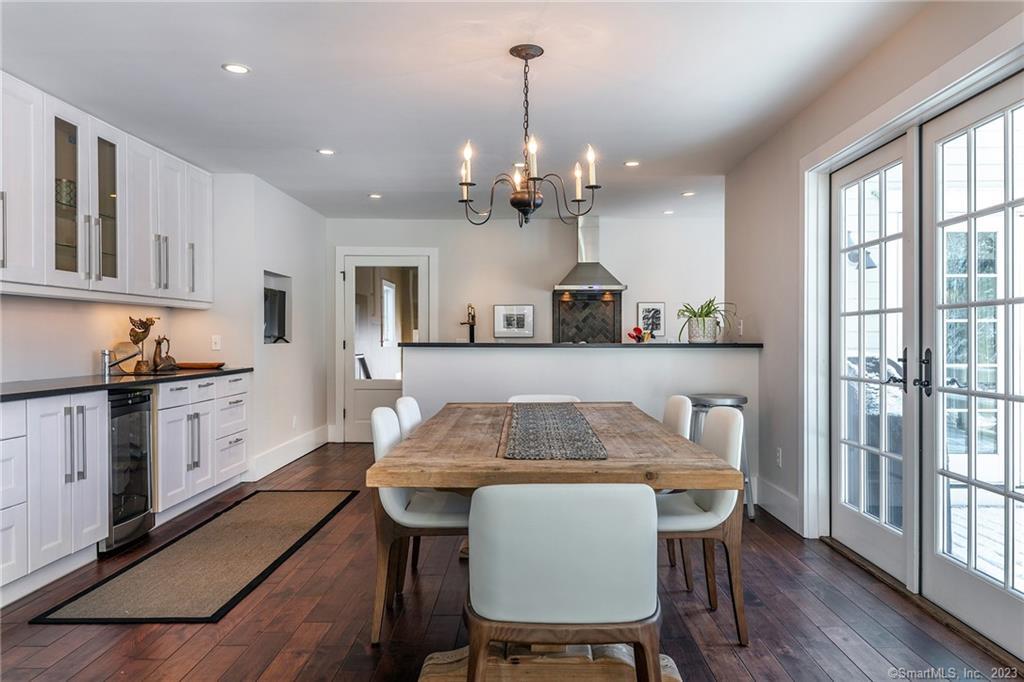 104 Lower Church Hill Road Washington, CT 06794 - Photo 6 of 23 a view of a dining room with furniture window and wooden floor