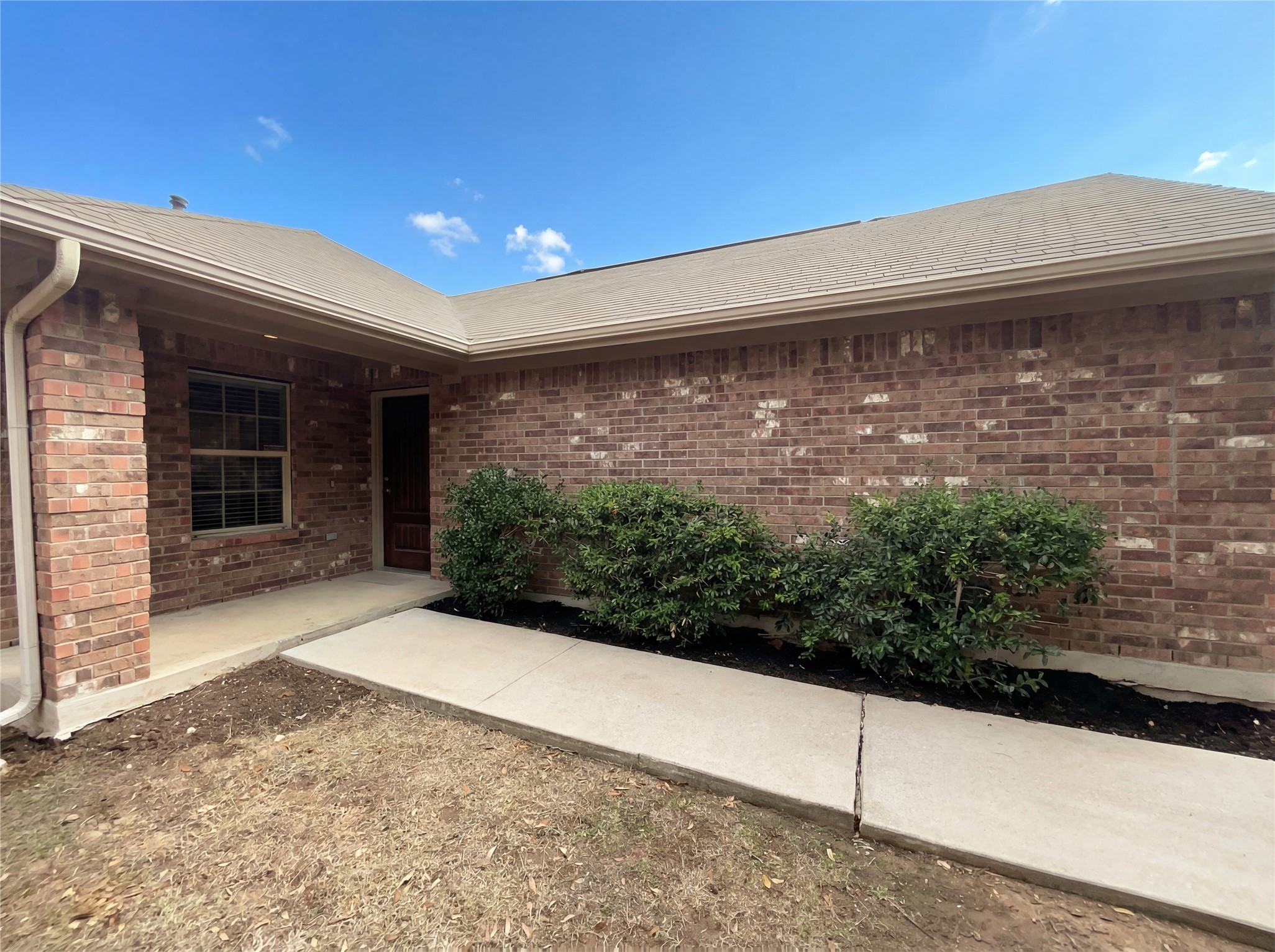 7208 Outfitter Drive Austin, TX 78744 - Photo 11 of 34 a view of backyard with potted plants