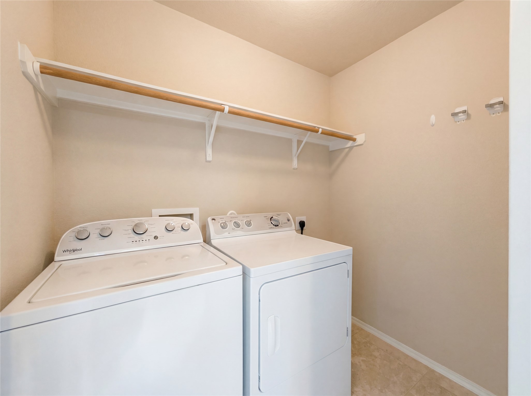 7208 Outfitter Drive Austin, TX 78744 - Photo 22 of 34 a utility room with dryer and washer