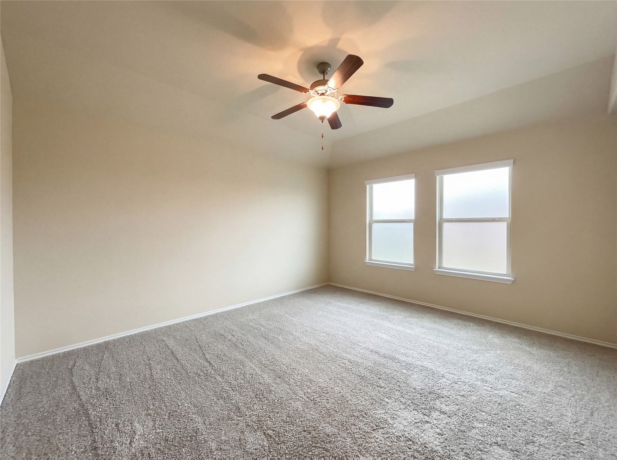 7208 Outfitter Drive Austin, TX 78744 - Photo 24 of 34 a view of a livingroom with a ceiling fan and window