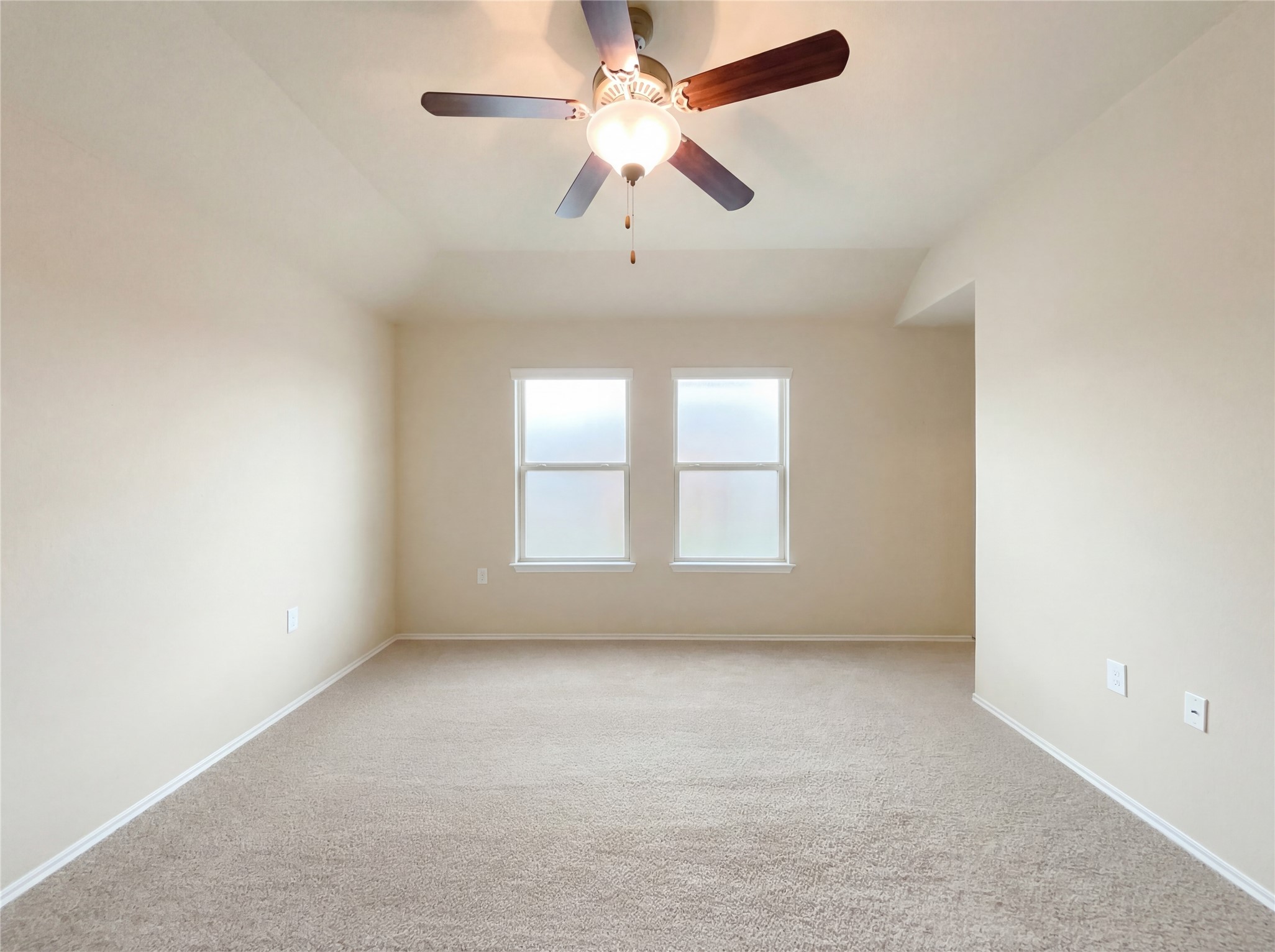 7208 Outfitter Drive Austin, TX 78744 - Photo 25 of 34 an empty room with a window and a ceiling fan