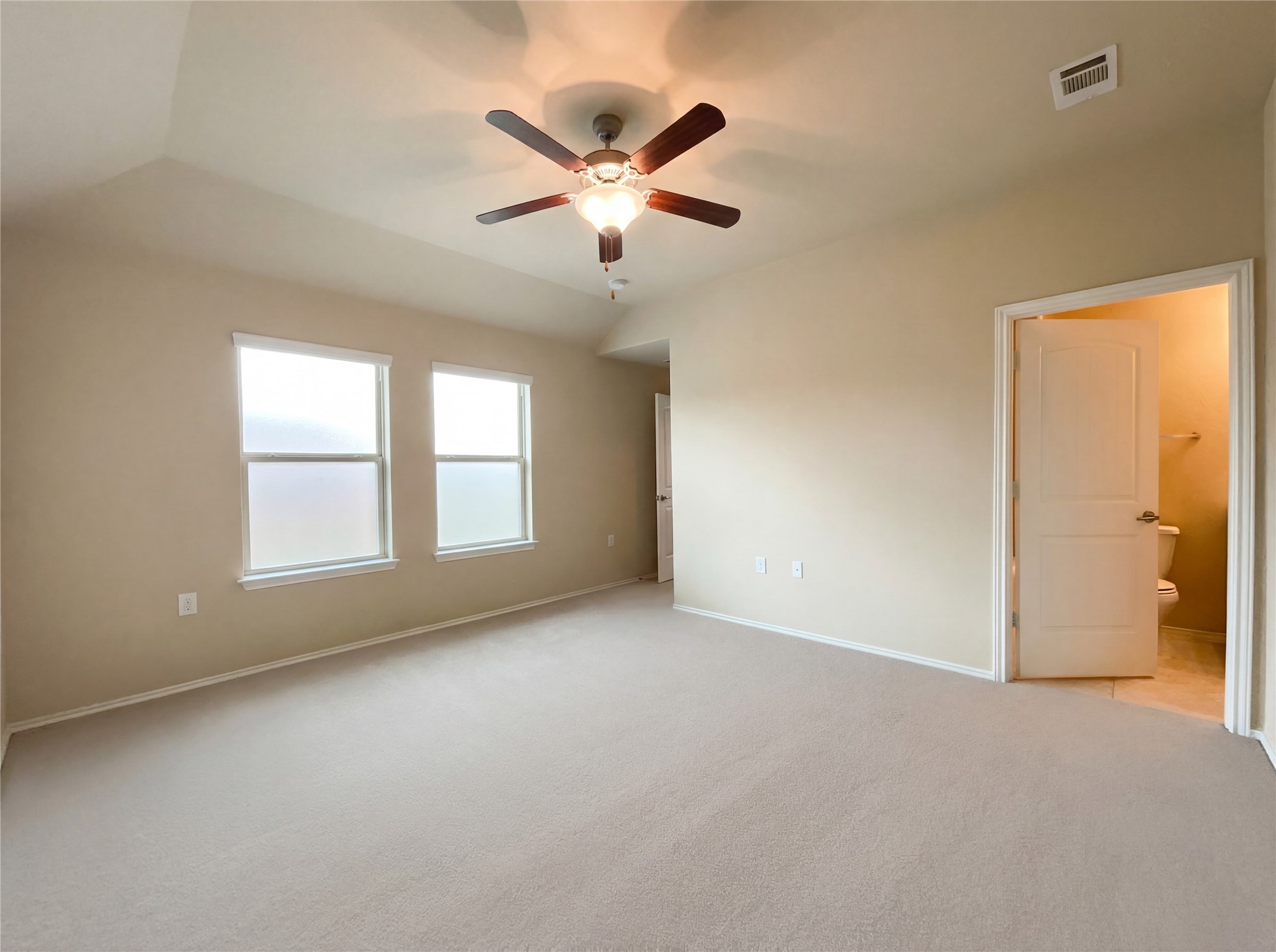 7208 Outfitter Drive Austin, TX 78744 - Photo 4 of 34 a view of a livingroom with a ceiling fan and window