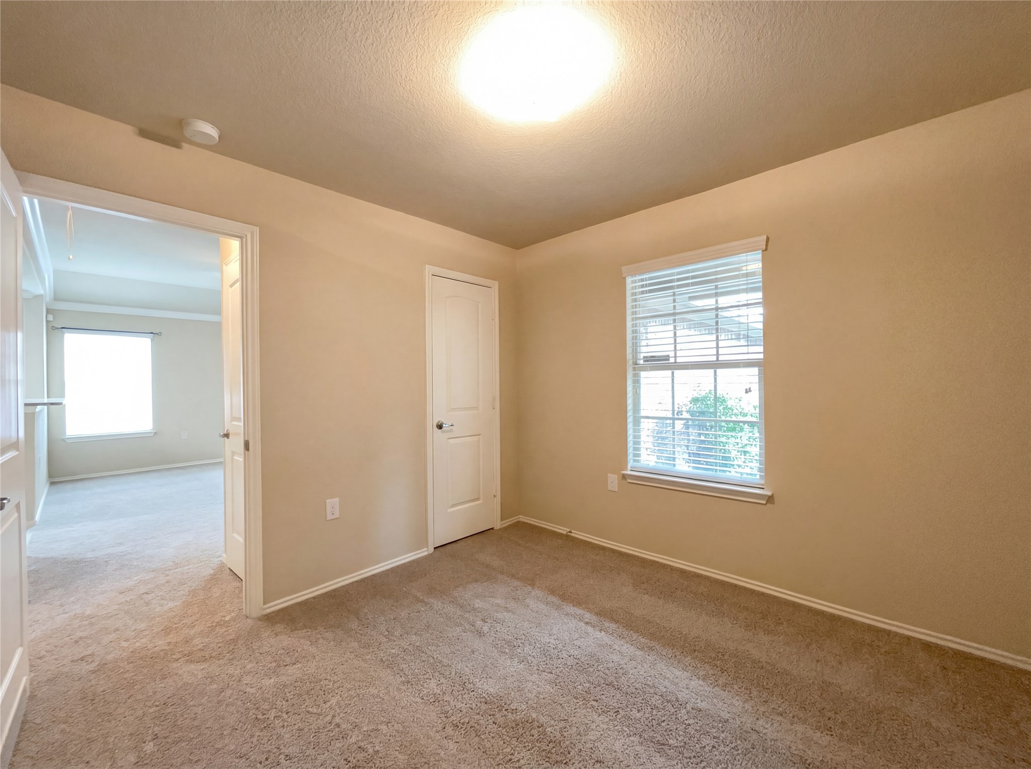 7208 Outfitter Drive Austin, TX 78744 - Photo 7 of 34 an empty room with windows