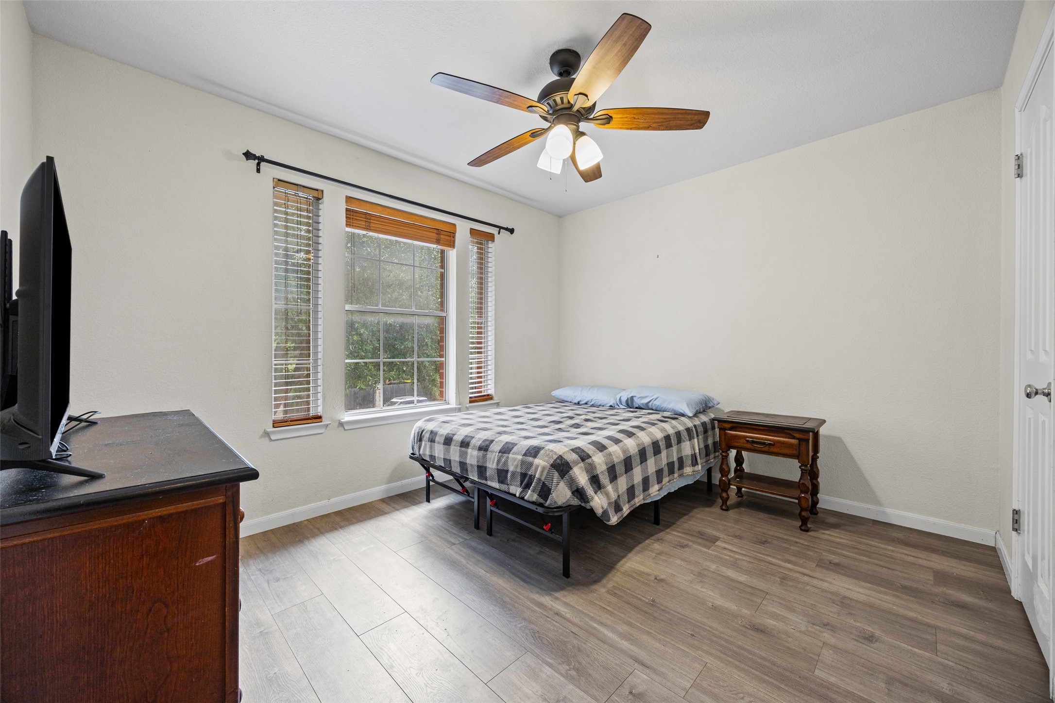 402 Autumn Trail Georgetown, TX 78626 - Photo 16 of 25 a bedroom with a bed and a window