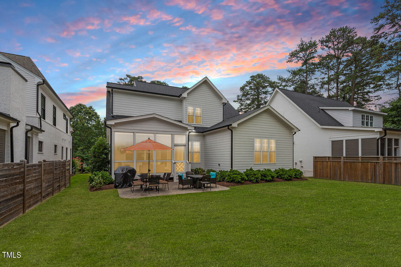 913 Canterbury Road Raleigh, NC 27607 - Photo 32 of 36 a front view of house with yard and green space