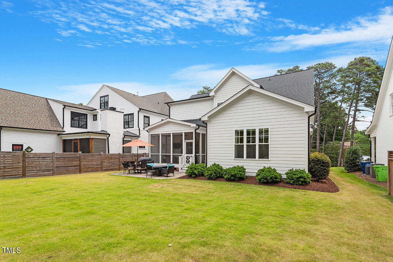 913 Canterbury Road Raleigh, NC 27607 - Photo 33 of 36 a front view of a house with garden