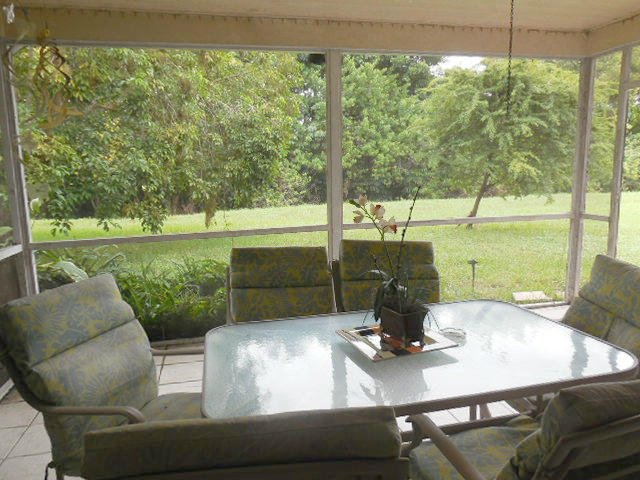 10375 Greenbriar Court Boca Raton, FL 33498 - Photo 28 of 41 SCREENED PATIO VIEW 1