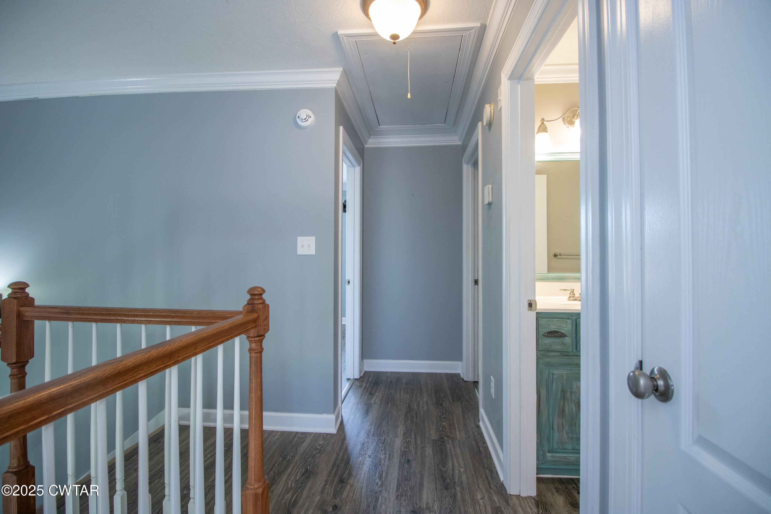241 Stone Ridge Cove Medina, TN 38355 - Photo 37 of 59 a view of a hallway with wooden floor and staircase