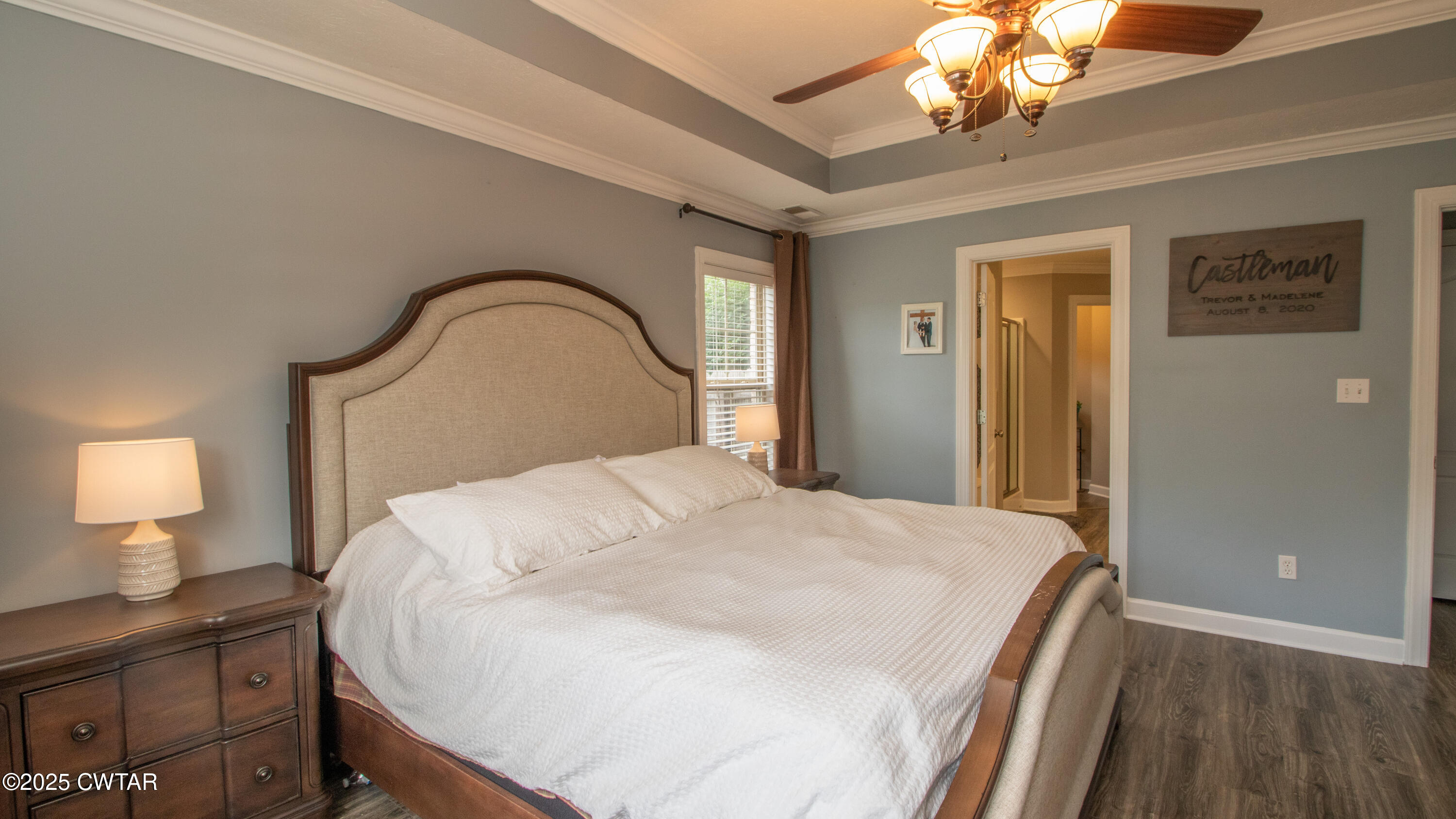241 Stone Ridge Cove Medina, TN 38355 - Photo 47 of 59 a bedroom with a bed and a lamp on table