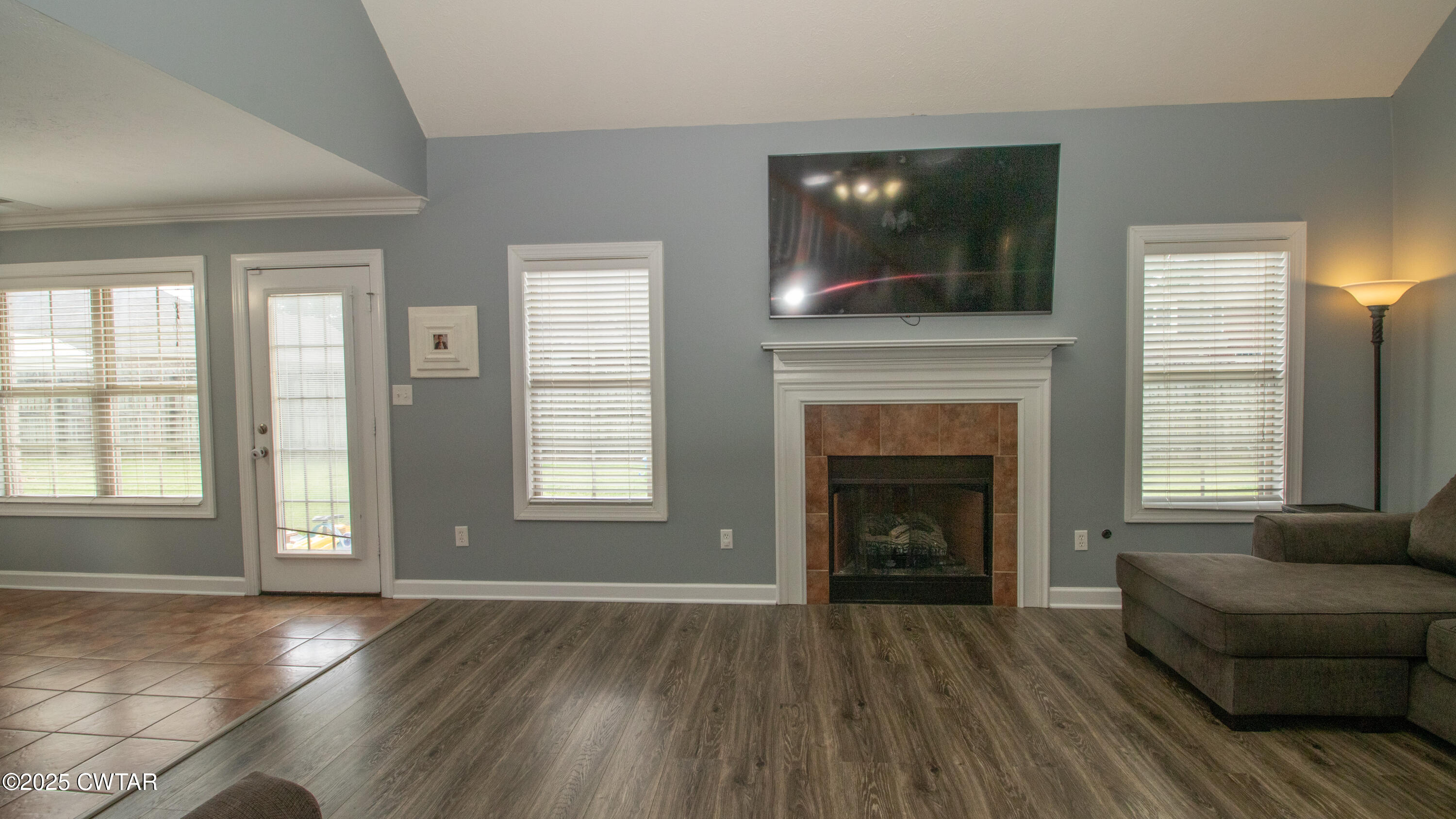 241 Stone Ridge Cove Medina, TN 38355 - Photo 49 of 59 a living room with furniture and a fireplace