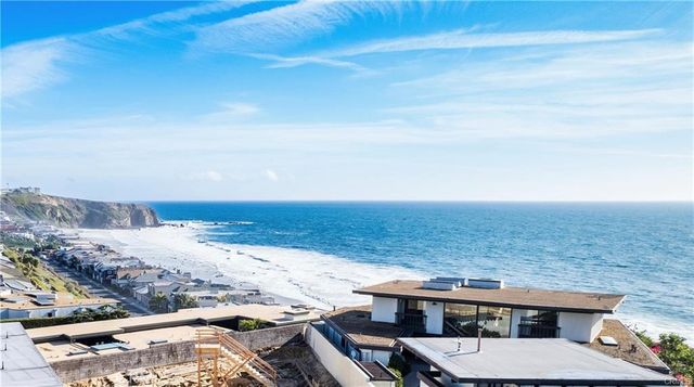 a view of a terrace with a lake