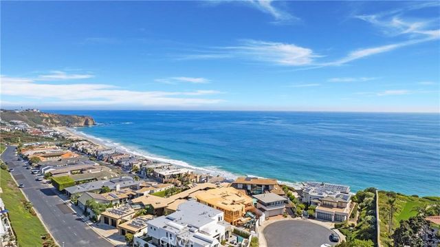 a room with furniture and a large window
