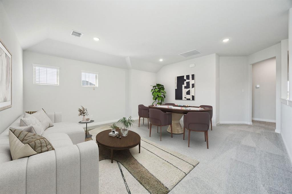 5803 Rushing River Way McKinney, TX 75071 - Photo 22 of 34 a living room with furniture and a table