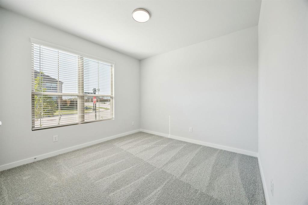 5803 Rushing River Way McKinney, TX 75071 - Photo 26 of 34 an empty room with a window
