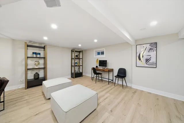 a living room with furniture and a table