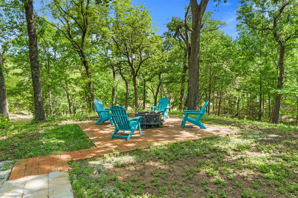 265 Shadow Oaks Streetman, TX 75859 - Photo 33 of 40 a view of a park with large trees
