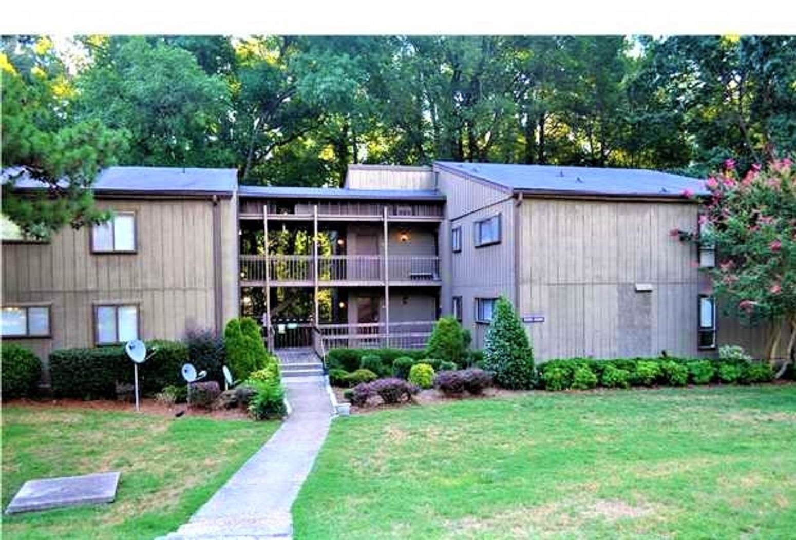 5052 Flint Ridge Place, Unit 5052 Raleigh, NC 27609 - Photo 1 of 67 a house view with a garden space
