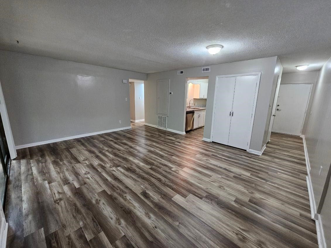5052 Flint Ridge Place, Unit 5052 Raleigh, NC 27609 - Photo 41 of 67 a view of a room with wooden floor