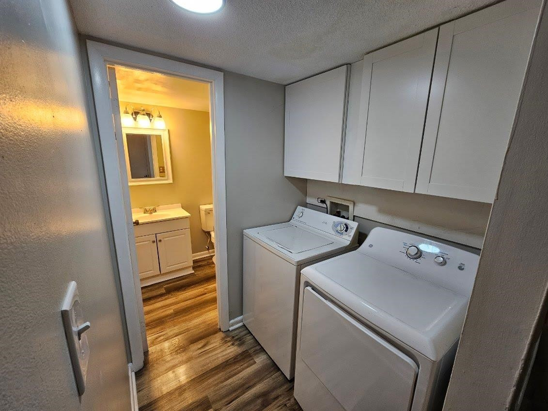 5052 Flint Ridge Place, Unit 5052 Raleigh, NC 27609 - Photo 51 of 67 a utility room with dryer and washer