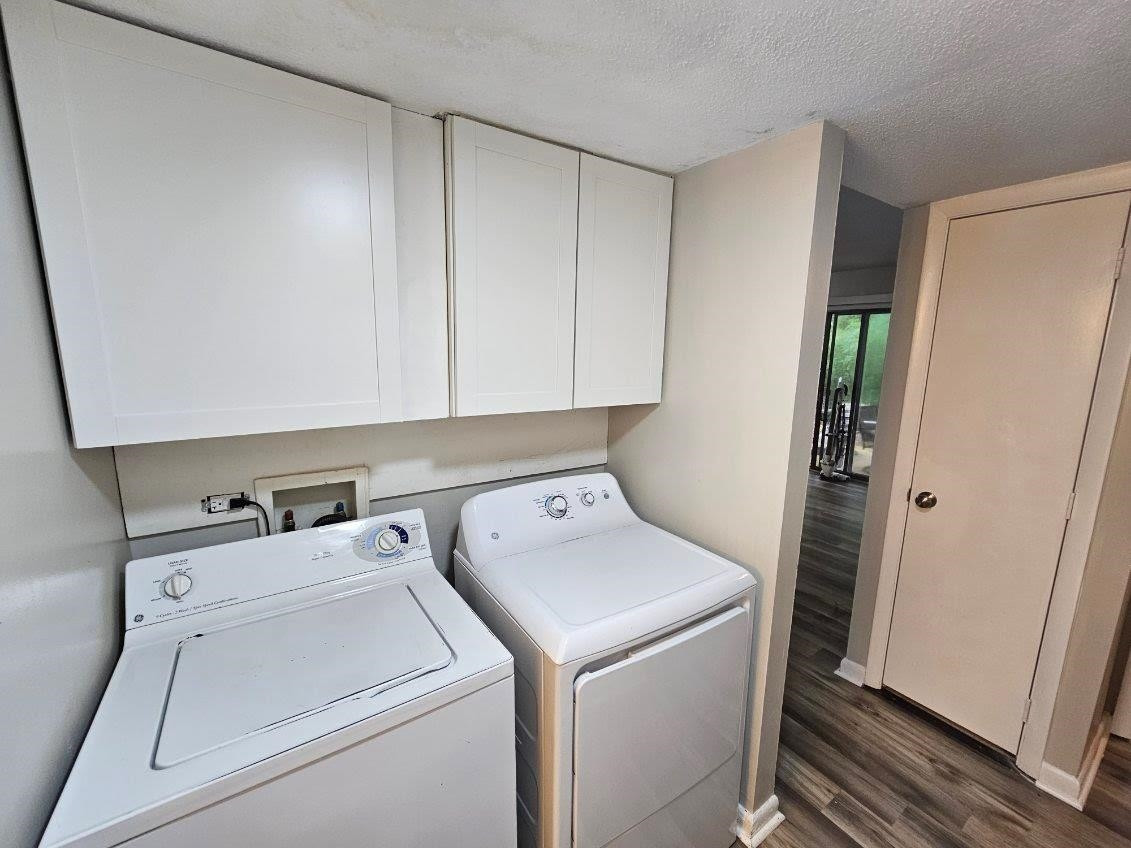 5052 Flint Ridge Place, Unit 5052 Raleigh, NC 27609 - Photo 53 of 67 a view of storage and utility room with washer and dryer