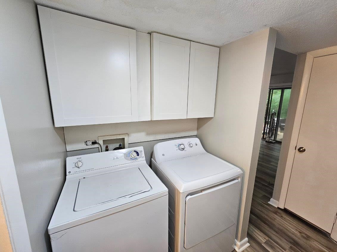 5052 Flint Ridge Place, Unit 5052 Raleigh, NC 27609 - Photo 55 of 67 a view of storage and utility room with washer and dryer