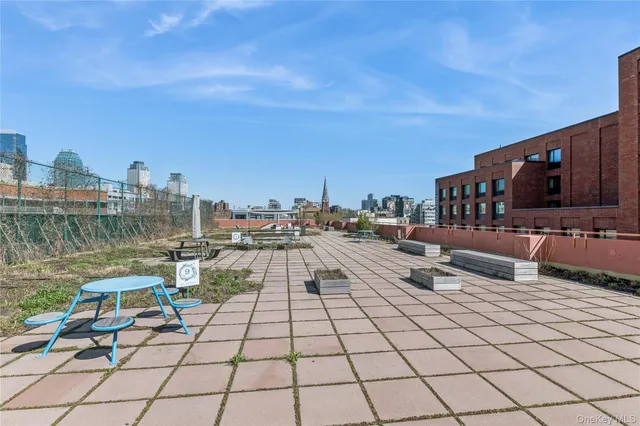 a view of balcony with furniture