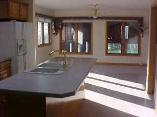 17876 Poplar Grove Road Poplar Grove, IL 61065 - Photo 3 of 6 a view of a hallway with furniture and chandelier