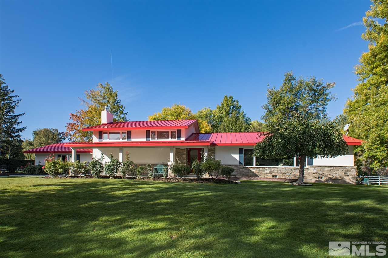 2145 Greentree Lane Reno, NV 89511 - Photo 1 of 25 a view of a park with a house in the background