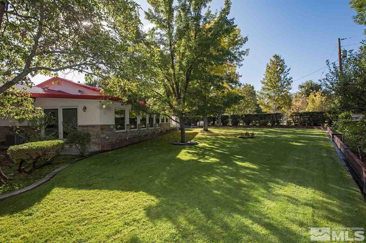 2145 Greentree Lane Reno, NV 89511 - Photo 20 of 25 a front view of a house with garden