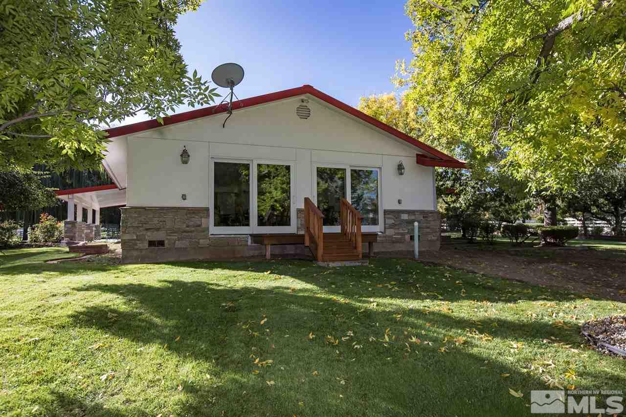 2145 Greentree Lane Reno, NV 89511 - Photo 21 of 25 a house view with a sitting space and garden