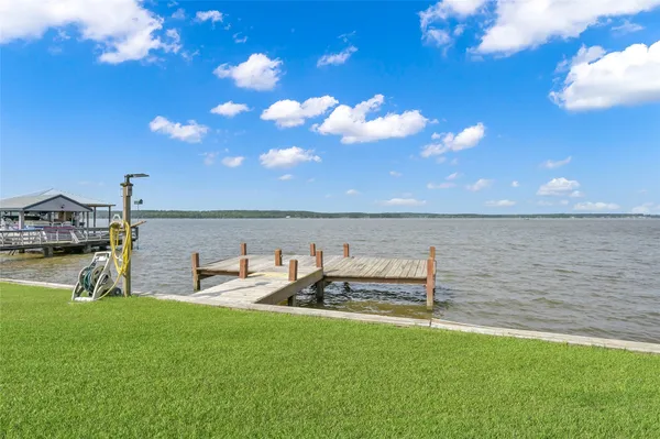 a view of a lake from a yard