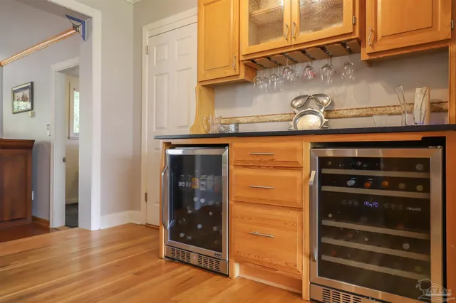 a kitchen with stainless steel appliances granite countertop a stove and a refrigerator