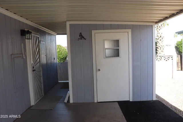 a view of a porch of a house