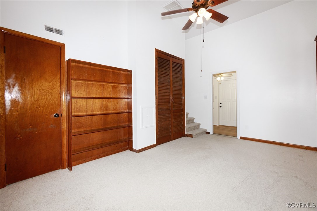 118 Winston Drive Williamsburg, VA 23185 - Photo 11 of 28 an empty room with closet and ceiling fan
