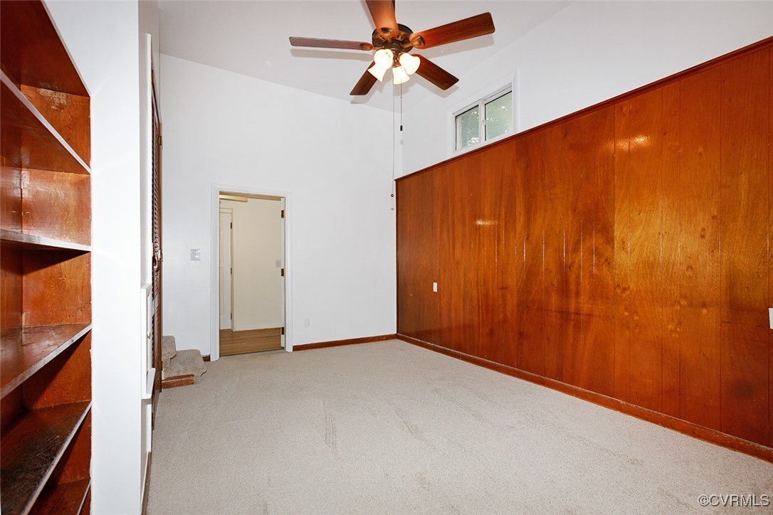 118 Winston Drive Williamsburg, VA 23185 - Photo 12 of 28 an empty room with closet and a chandelier fan