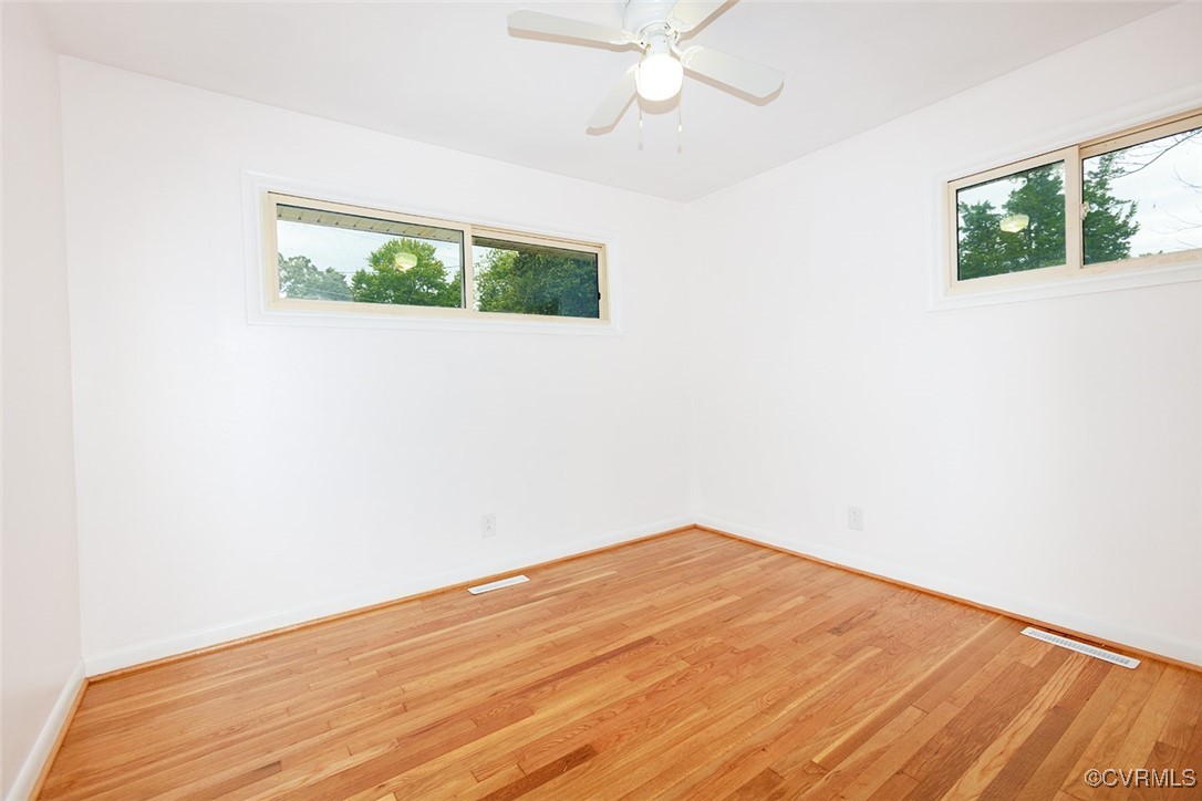 118 Winston Drive Williamsburg, VA 23185 - Photo 19 of 28 a view of an empty room with a window