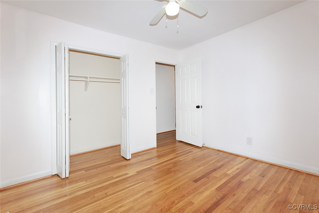 118 Winston Drive Williamsburg, VA 23185 - Photo 20 of 28 a view of an empty room with wooden floor