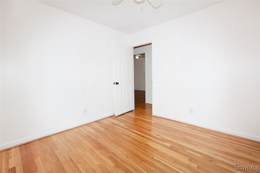 118 Winston Drive Williamsburg, VA 23185 - Photo 22 of 28 a view of an empty room with wooden floor