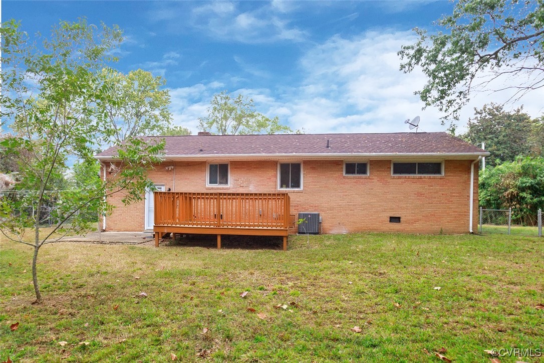 118 Winston Drive Williamsburg, VA 23185 - Photo 23 of 28 a front view of a house with a yard and garage