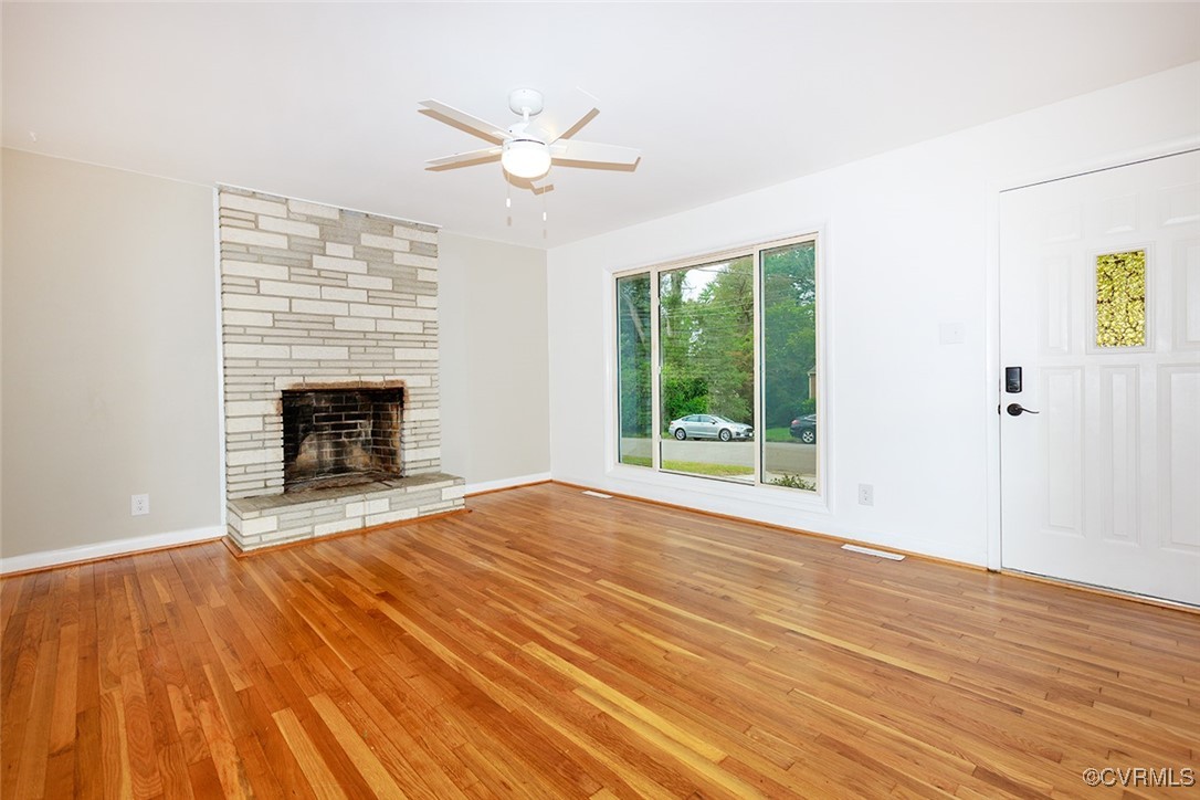 118 Winston Drive Williamsburg, VA 23185 - Photo 3 of 28 a view of empty room with wooden floor and fan