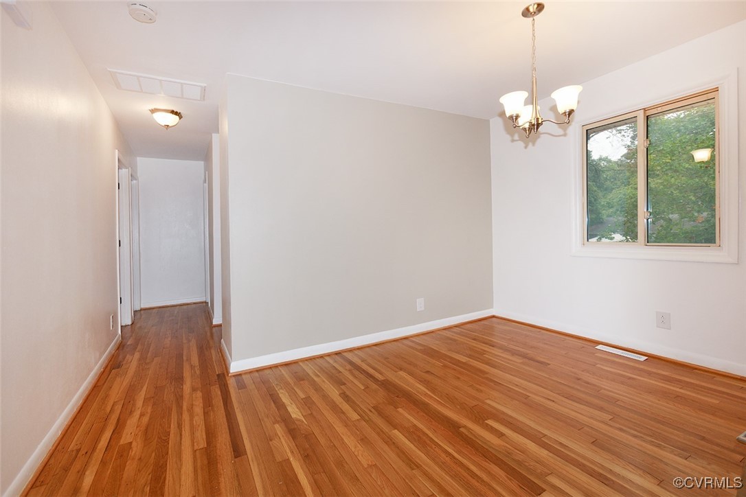 118 Winston Drive Williamsburg, VA 23185 - Photo 10 of 28 a view of empty room with wooden floor and fan
