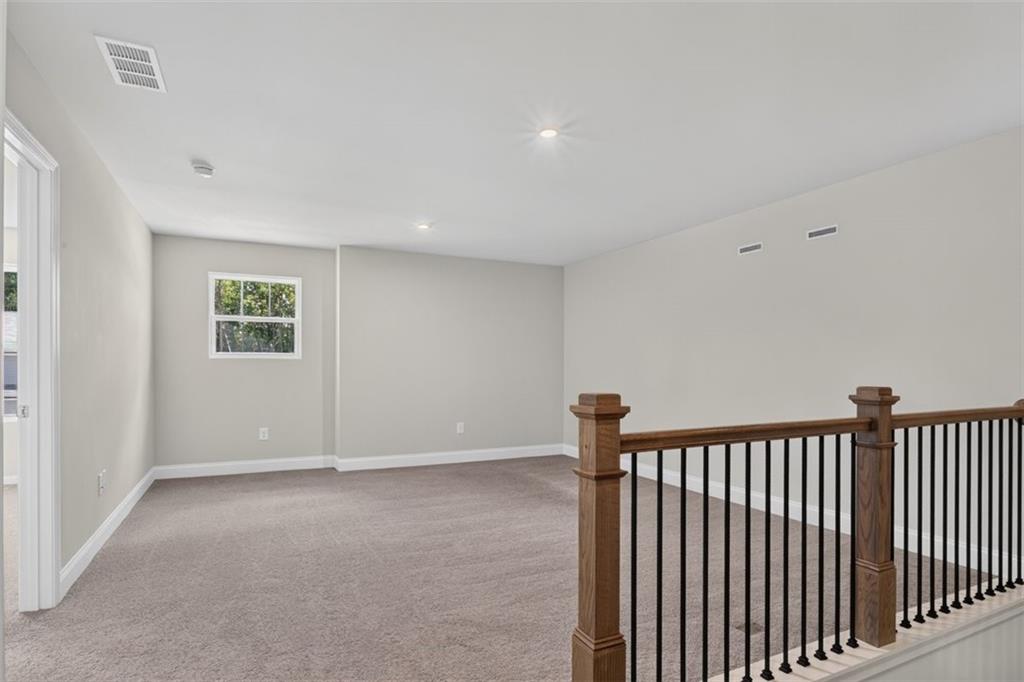 107 Ledgemont Way Acworth, GA 30101 - Photo 23 of 57 a view of an empty room